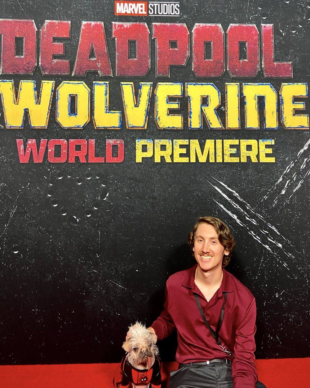 Derek Toth with an animal actor at the Deadpool & Wolverine world premiere